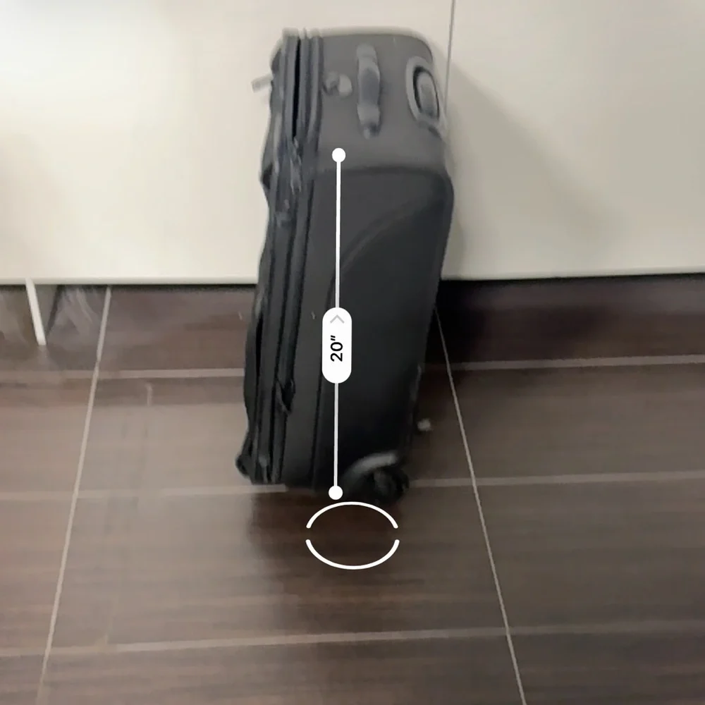 Tumi Black Rolling Carry-On Travel Bag